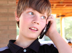 electronics_teen-on-cellphone_146801320-thumb-240xauto-4970